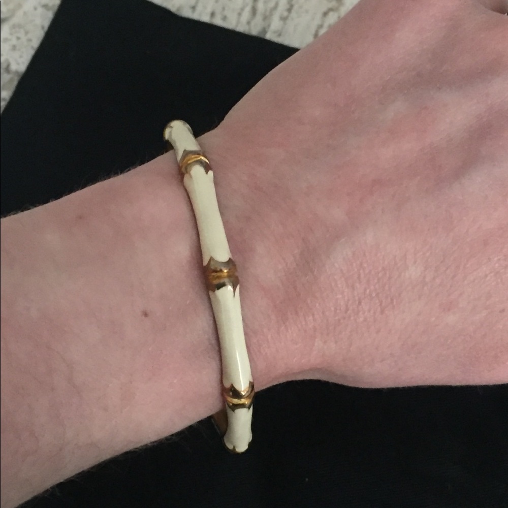 Cream enamel and gold tone bangle bracelet